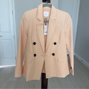 A Loves A Pale Orange Blazer